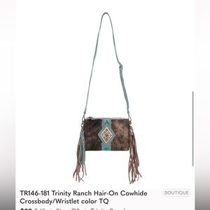ISO TR146-181 Trinity Ranch Hair-On Cowhide
Crossbody/Wristlet color TQ